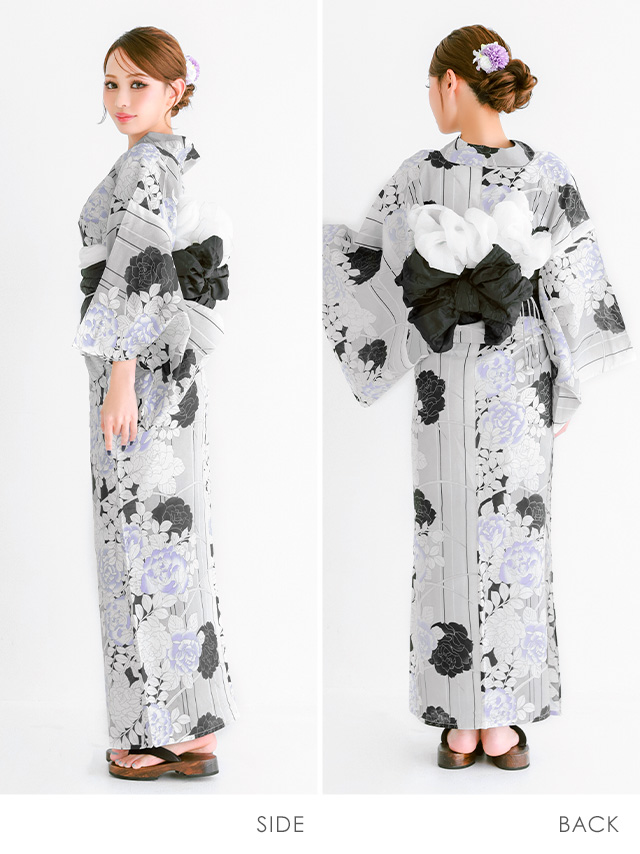 黒帯で全体を引き締め、洗練された雰囲気を演出するグレー地に黒とラベンダーの花柄が華やかに咲く粋浴衣